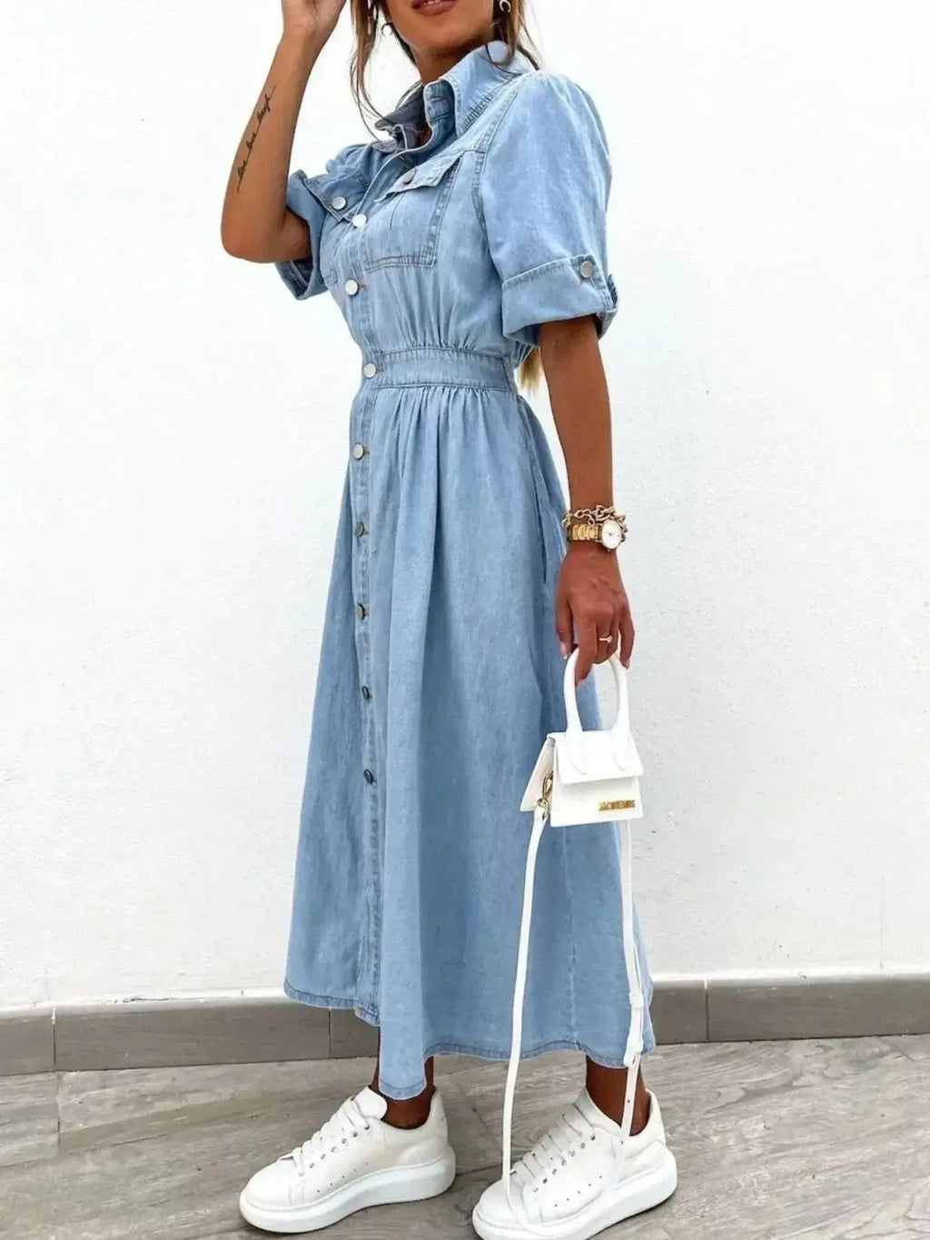 Plus size denim shirt dress with roll-up sleeves and front pockets, casual and stylish Trendsi denim dress for women.