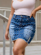Plus size pearl-embellished raw hem denim skirt by Trendsi, stylish casual midi denim skirt for women.