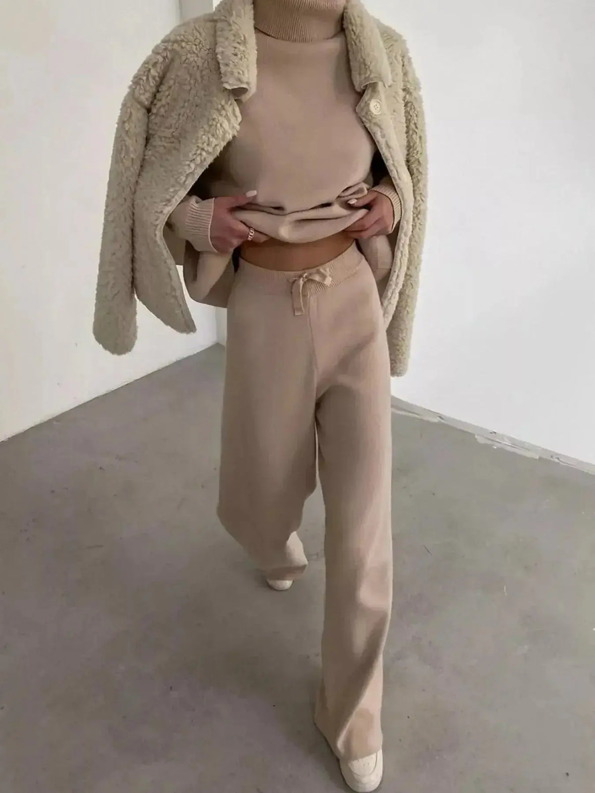 Plus size turtleneck long sleeve sweater and pants lounge set by Plush Fashion Hub, soft and comfortable two-piece outfit for relaxing.