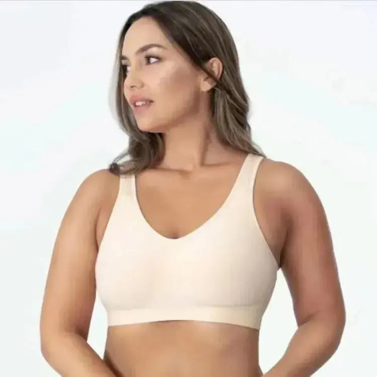 Plus-size Plush Fashion Hub seamless shaper bra in bright lingerie, supporting women with a comfortable, supportive fit.
