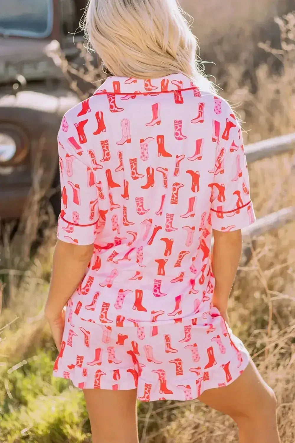 Printed button-down pajama shirt and shorts loungewear set by Trendsi, featuring a comfortable and stylish sleepwear design.