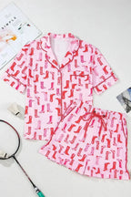 Printed button-down pajama shirt and shorts loungewear set by Trendsi, featuring a comfortable, lightweight fabric with a stylish print.