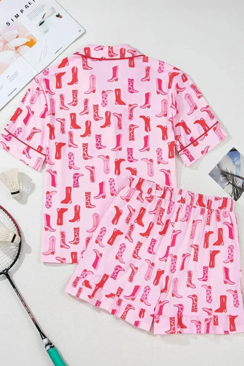 Printed button-down pajama shirt and shorts loungewear set by Trendsi, featuring a comfortable, casual sleepwear ensemble.