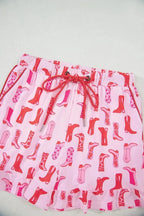 Printed button-down shirt and shorts pajama loungewear set by Trendsi, featuring a comfortable, stylish sleepwear design.