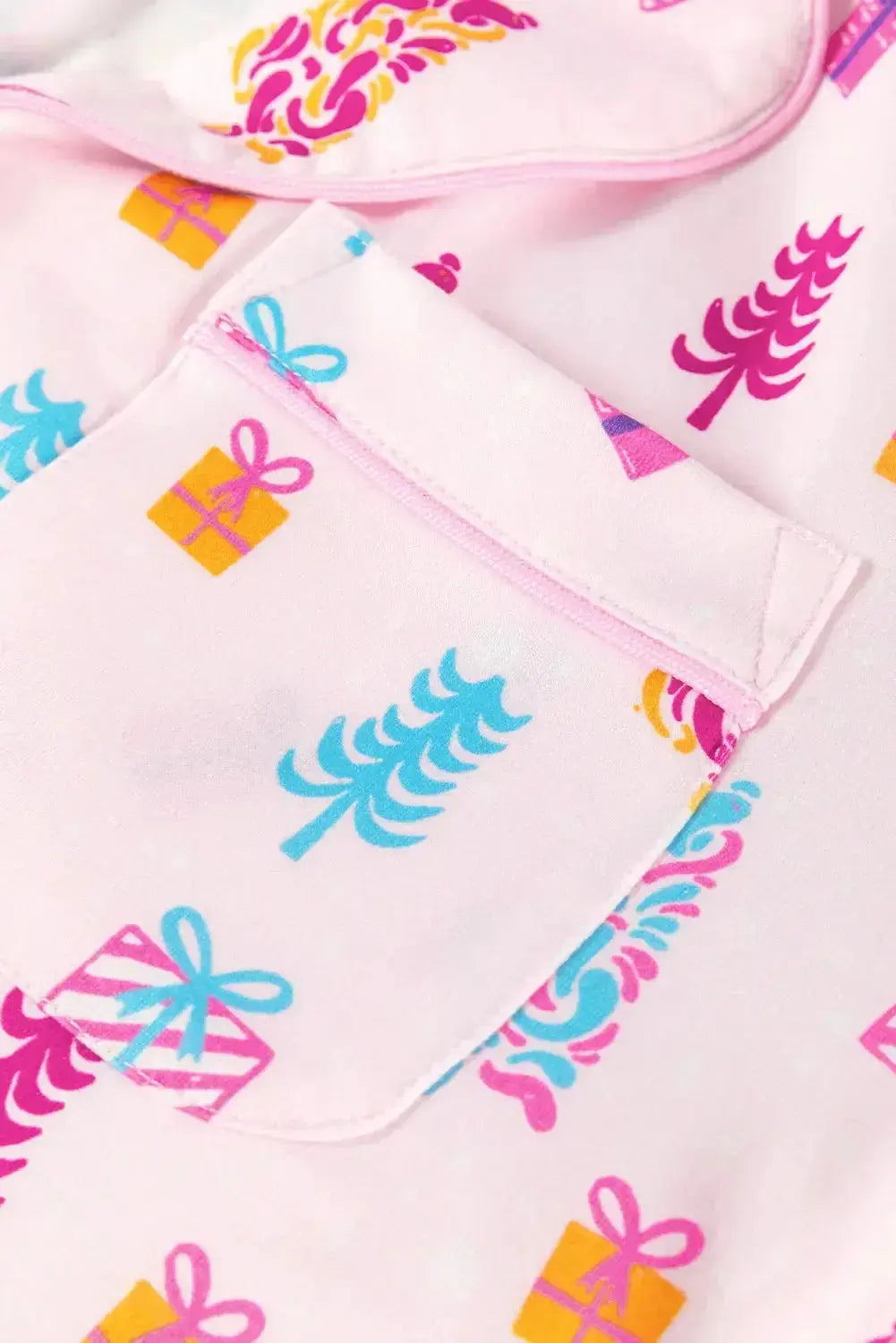 Printed collared long sleeve lounge dress with pockets, stylish pajamas by Trendsi, made of soft plush fabric for comfort.