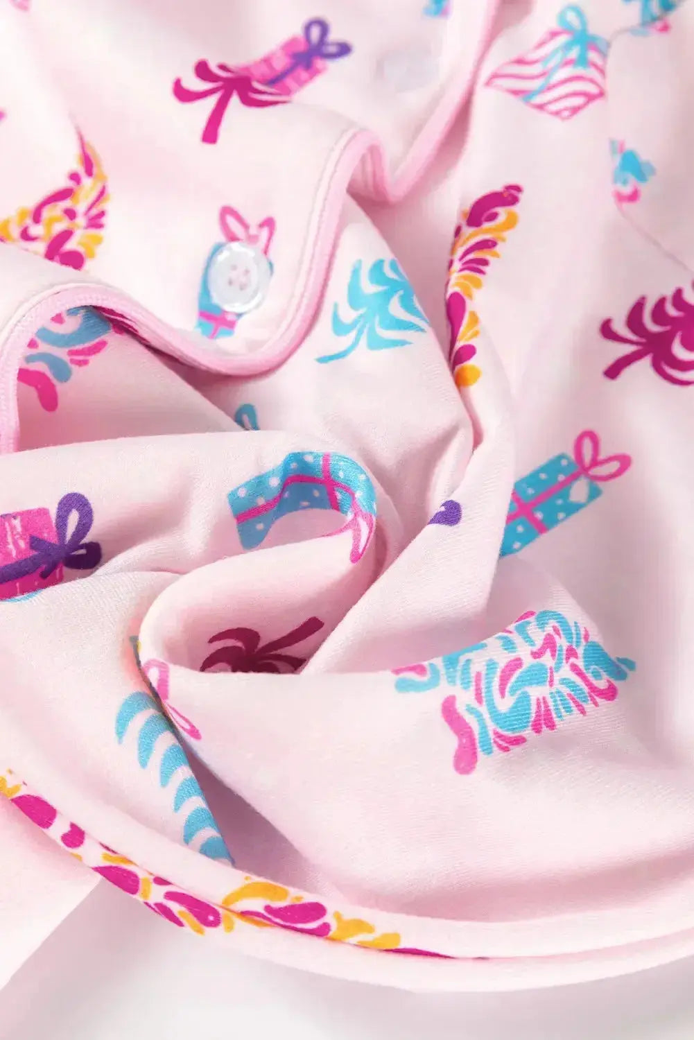 Printed collared long sleeve lounge dress with pockets, trendy pajamas by Trendsi in soft, comfortable fabric.