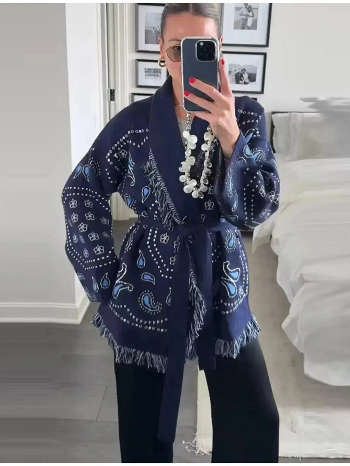 Bohemian printed fringe knit cardigan with long sleeves and tie front from Plush Fashion Hub, perfect for casual stylish wear.