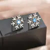 Silver flower stud earrings in S925 silver, featuring a trendy and versatile floral design, perfect for everyday wear.