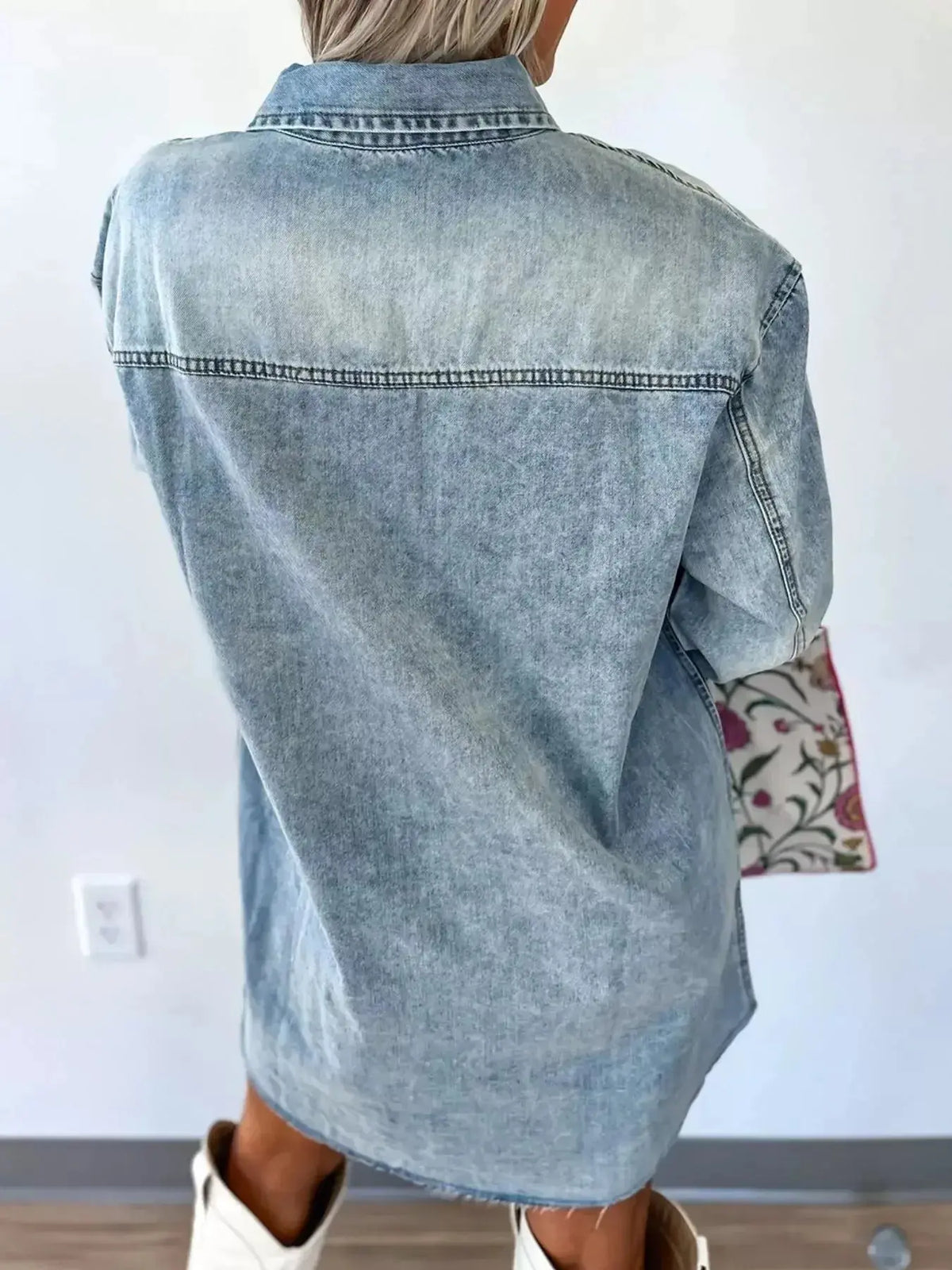 Relaxed cotton denim shirt dress with buttons, pockets, and raw hem from Plush Fashion Hub, showcasing a casual, trendy style.
