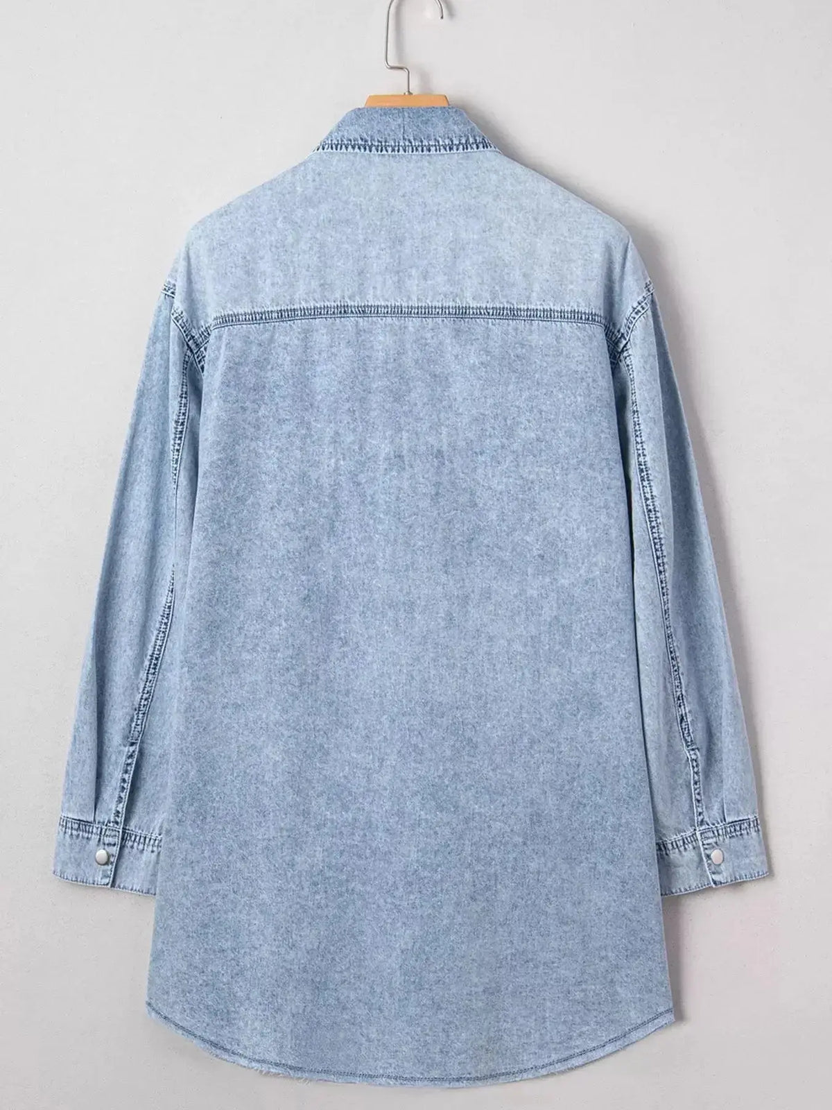 Relaxed cotton denim shirt dress by Plush Fashion Hub featuring a button-down front, pockets, raw hem, and casual fit.