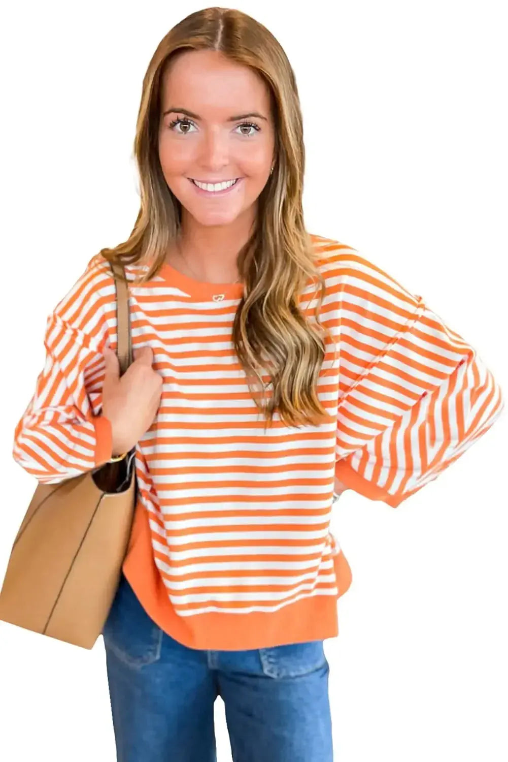 Red striped long sleeve top with drop shoulder design and exposed seams by Plush Fashion Hub, casual and stylish for everyday wear.