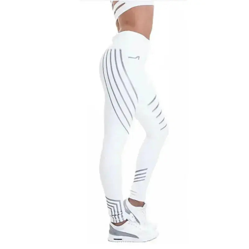 Women's high-waist reflective yoga pants from Plush Fashion Hub, breathable activewear with a sleek fit and reflective accents.