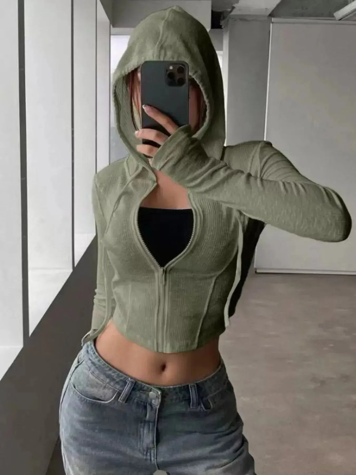 Women's hooded ribbed knit cropped zip-up jacket from Plush Fashion Hub, featuring a cozy outerwear design and front zipper.
