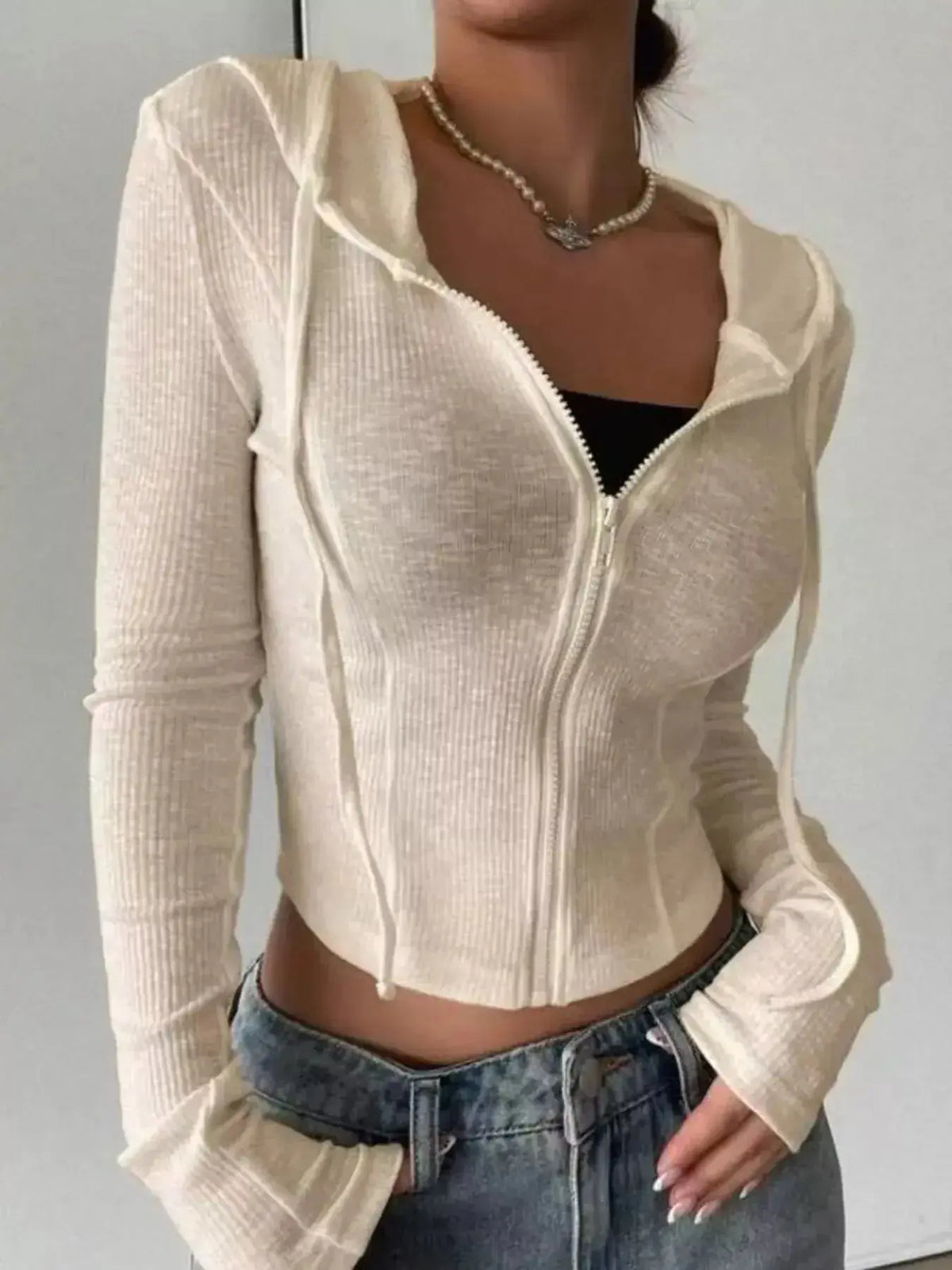Women's ribbed knit cropped zip-up hooded jacket from Plush Fashion Hub, stylish outerwear with a fitted, cozy design.