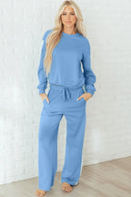 Robin and sweatpants lounge set by Threaded Pear, featuring a cozy robin-themed top and matching comfortable sweatpants.