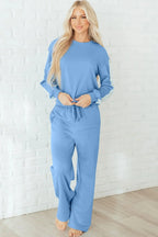 Robin and sweatpants lounge set by Threaded Pear, featuring a cozy sweatshirt and matching relaxed-fit sweatpants.