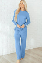 Robin and sweatpants lounge set by Threaded Pear, featuring cozy sweatshirt and matching joggers in soft fabric.