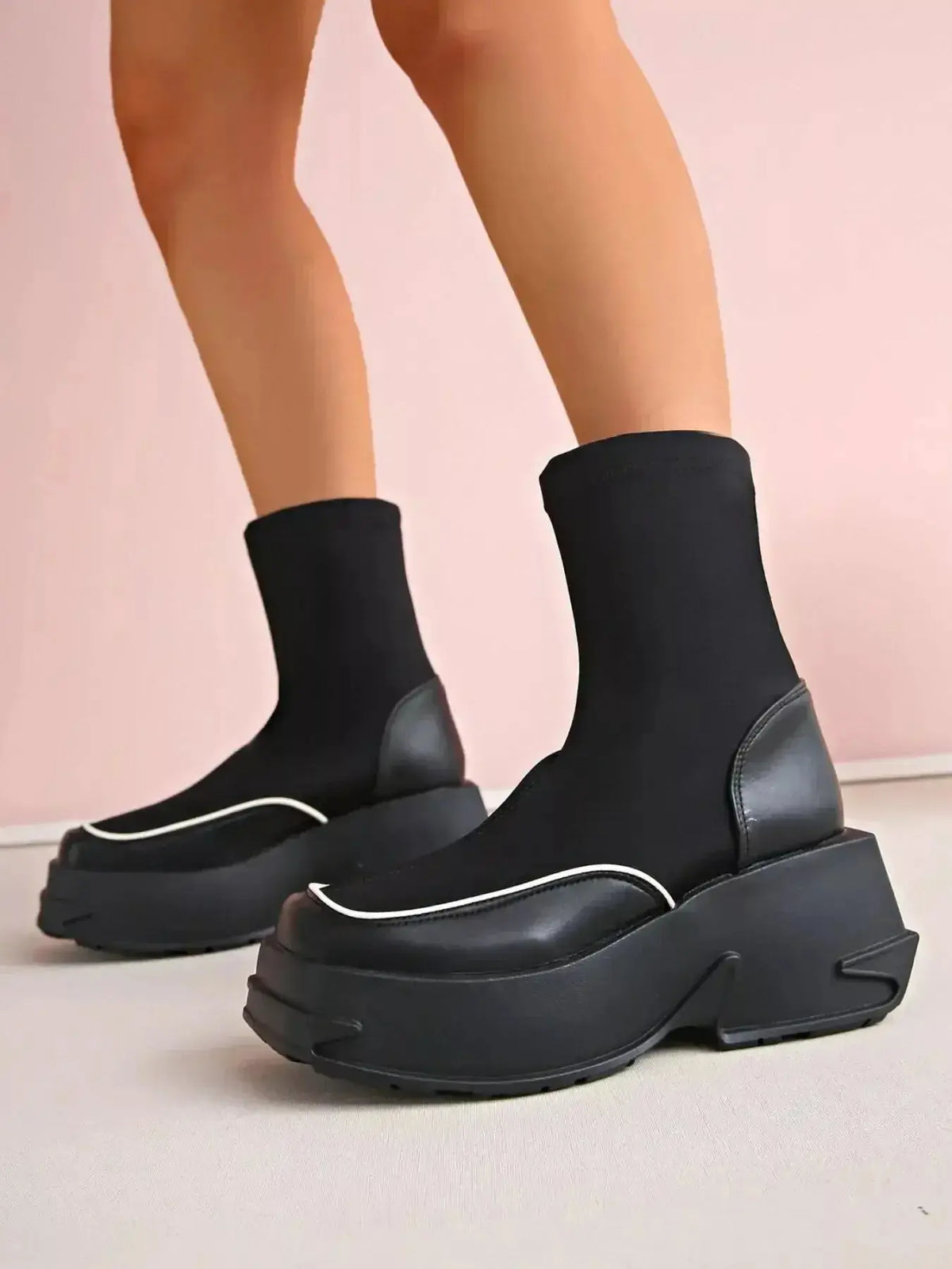 Women’s round toe platform high heel boots by Plush Fashion Hub, featuring sleek design and sturdy heel for stylish comfort.