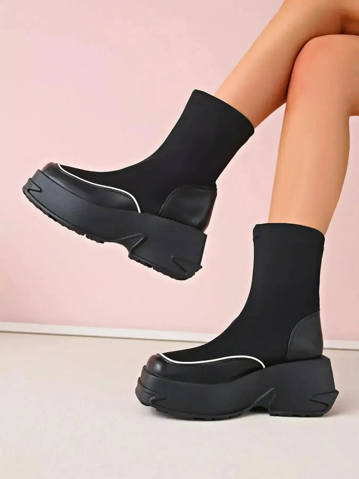 Women’s round toe platform high heel boots by Plush Fashion Hub, featuring sleek design and sturdy heel detail.