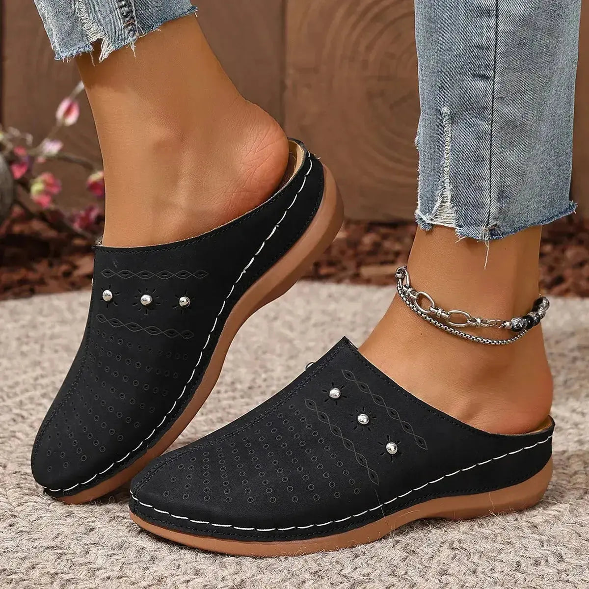 Women's round toe slip-on flats with studded details in soft vegan leather from Plush Fashion Hub.