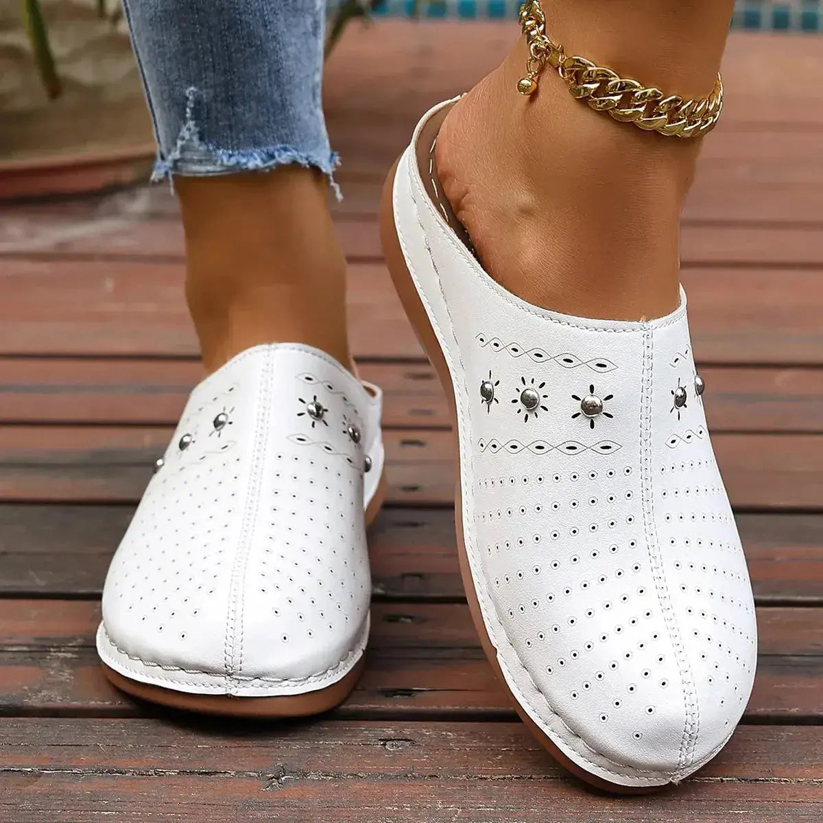 Women's round toe slip-on flats with studded details in soft vegan leather by Plush Fashion Hub.