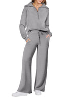 Women two-piece sweatshirt and wide-leg pants set by Plush Fashion Hub, featuring a casual, comfortable matching outfit.