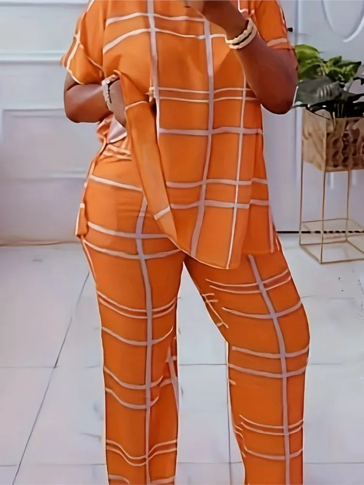 Plus size women's two-piece set with striped grid print and casual round neck, by Plush Fashion Hub.