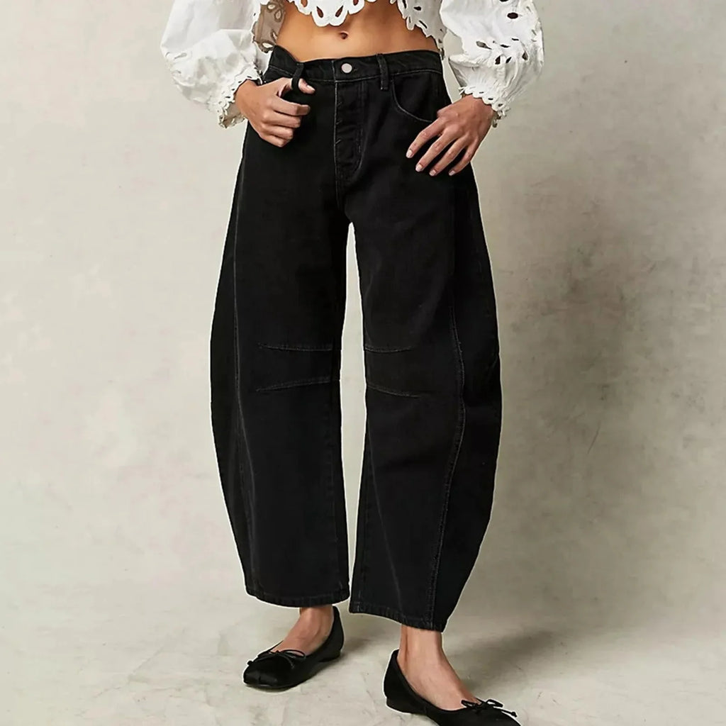 Women’s Y2K baggy mid-waist wide-leg jeans from FitiqueFit featuring a casual streetwear style and relaxed fit.