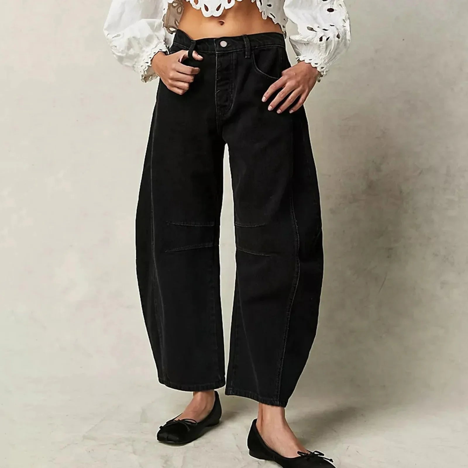 Women’s Y2K baggy mid-waist wide-leg jeans from FitiqueFit featuring a casual streetwear style and relaxed fit.