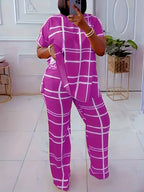 Plus size women’s casual two-piece set with striped grid print and round neck, by Plush Fashion Hub.