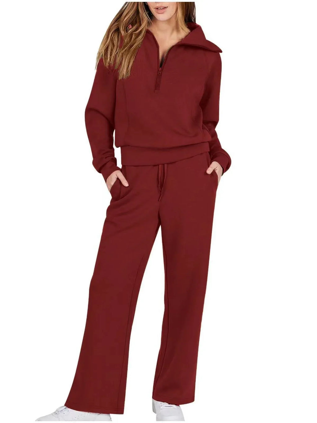 Women two-piece set with sweatshirt and wide-leg pants by Plush Fashion Hub, featuring a comfortable, casual style.