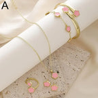 Plum Blossom Plant necklace and earring set featuring five leaf flower charms, crafted by Plush Fashion Hub.