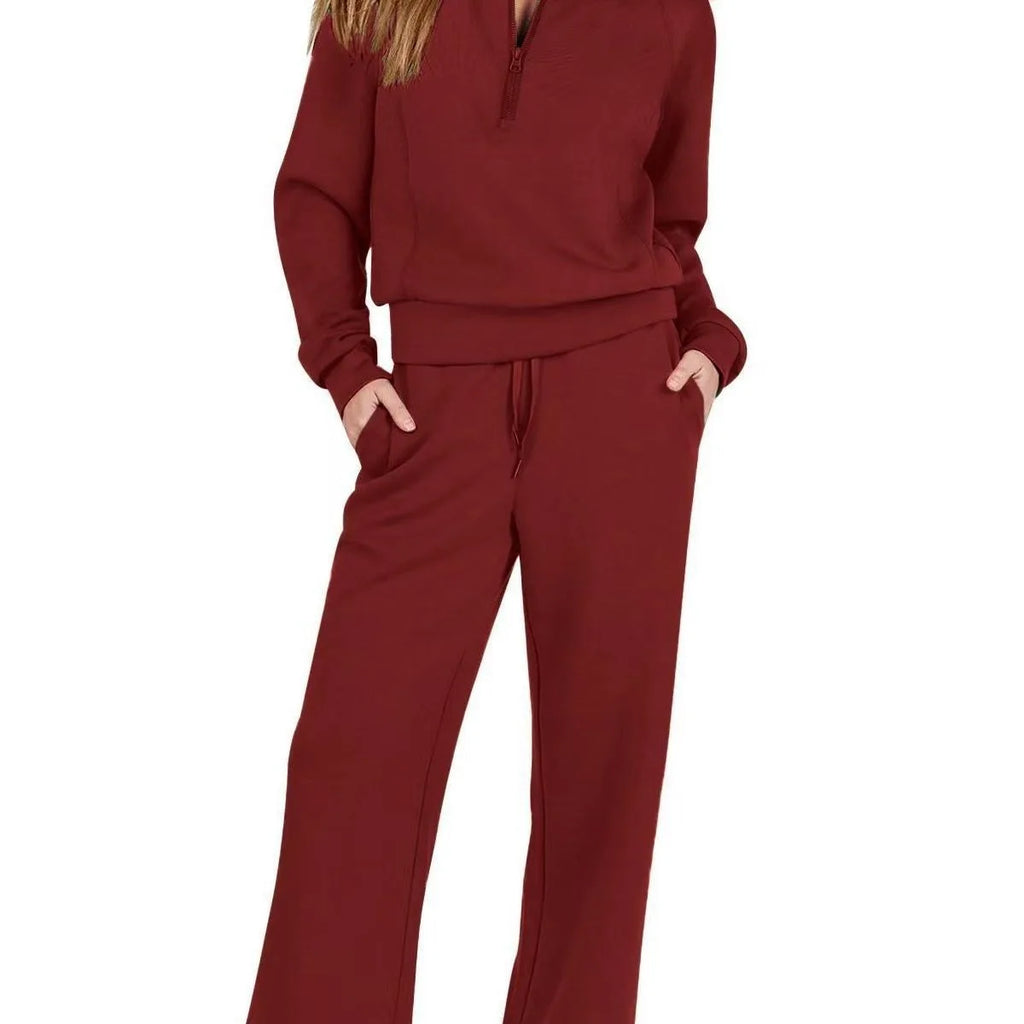 Women two-piece sweatshirt and wide-leg pants set by Plush Fashion Hub, featuring comfortable, stylish casual clothing.
