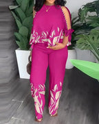 Plus size women's two-piece outfit by Plush Fashion Hub featuring a short sleeve top and matching shorts.