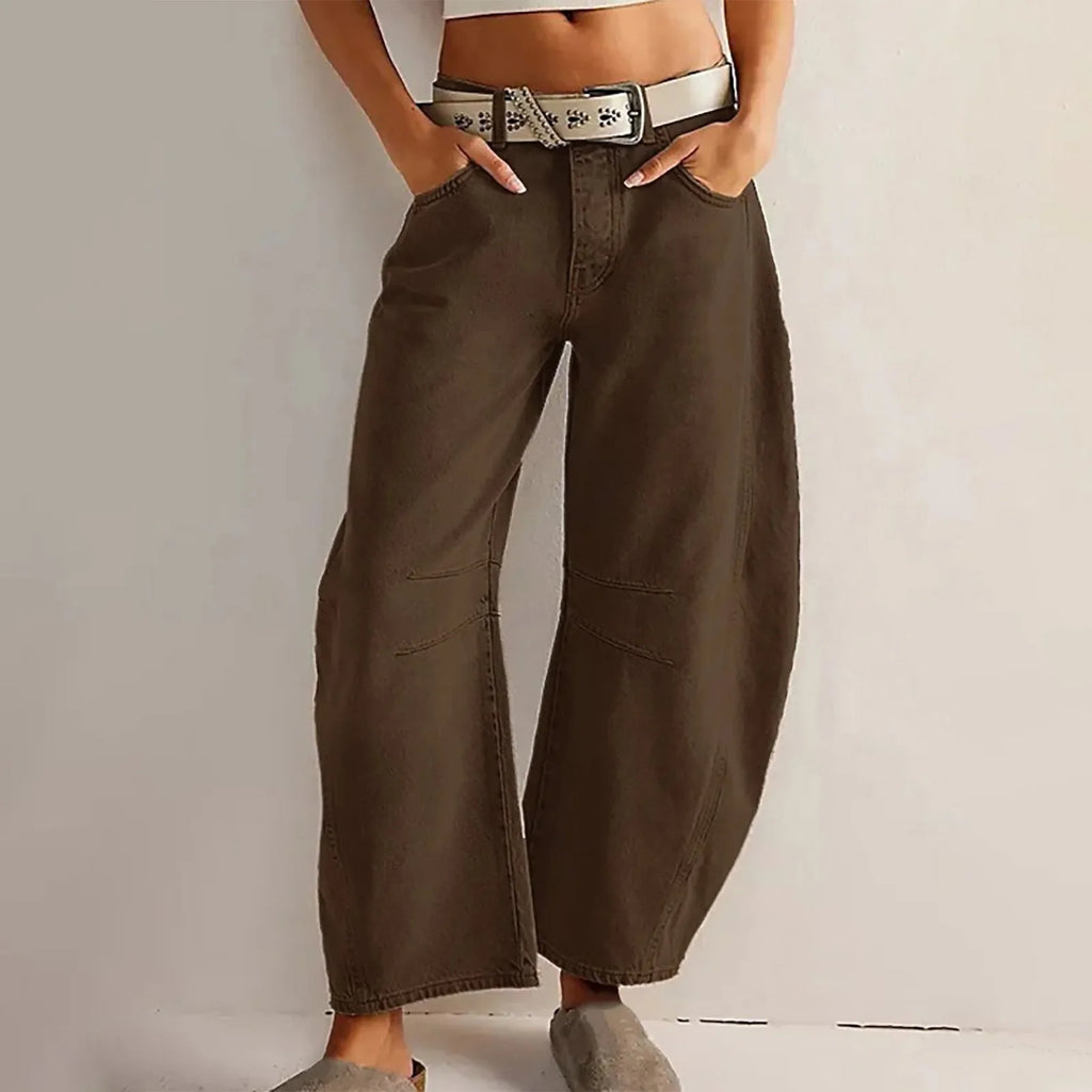 Women's Y2K baggy mid-waist wide-leg jeans by FitiqueFit, featuring a casual streetwear style with relaxed fit and vintage-inspired design.