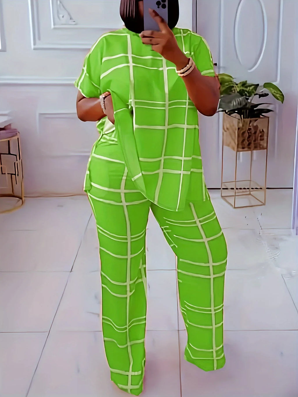 Plus size women’s casual two-piece set with striped grid print and round neck from Plush Fashion Hub, featuring a comfortable, stylish design.