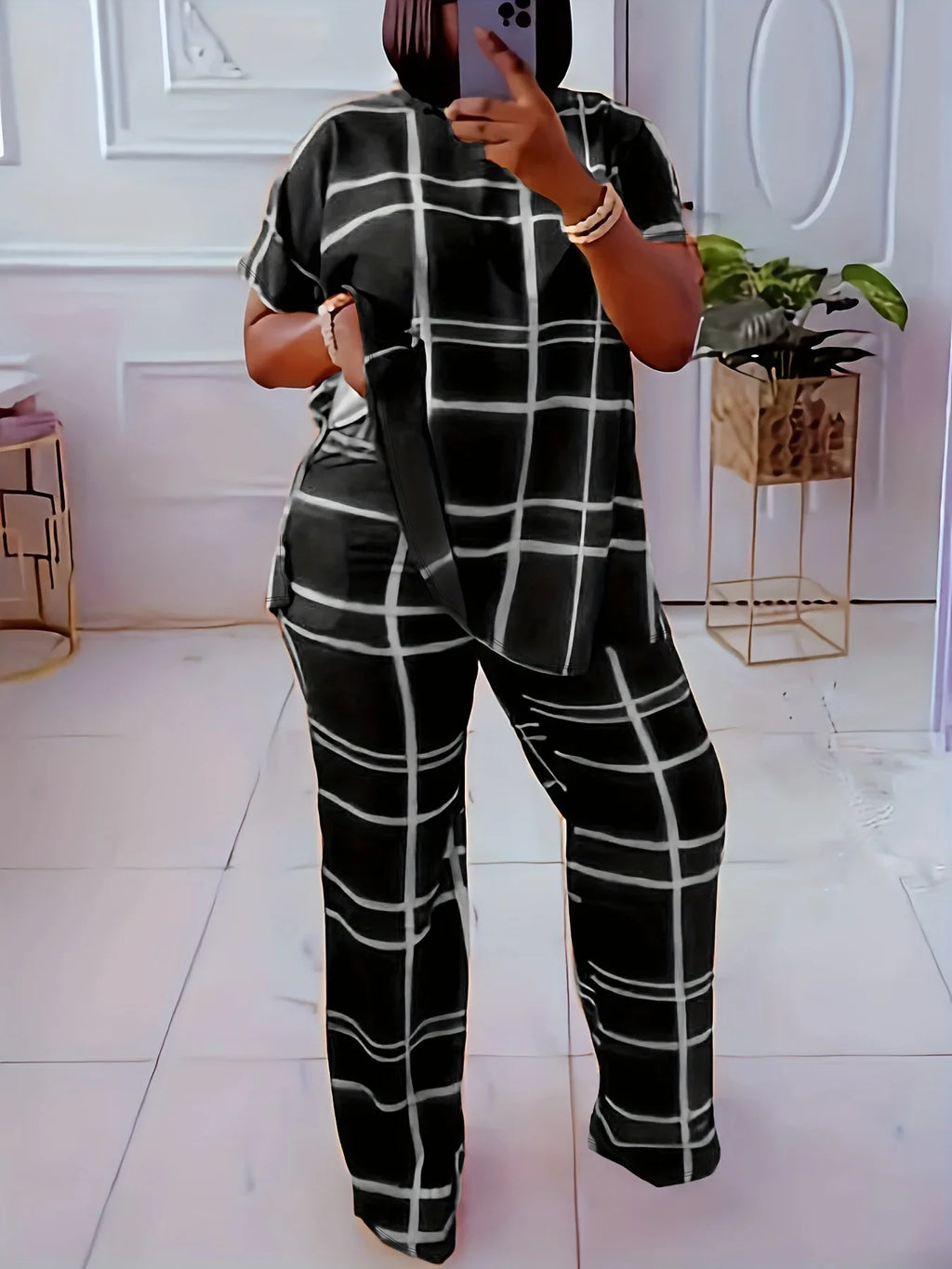Plus size women’s Elements striped grid printed casual two-piece set with round neck top and matching pants by Plush Fashion Hub