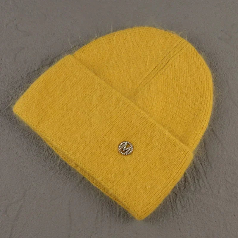 Women solid color fur knitted bonnet in yellow, warm ski beanie for winter.