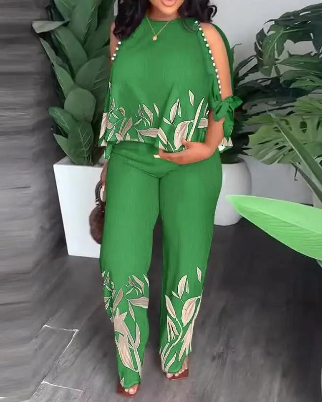 Plus size women’s two-piece fashion outfit with short sleeves, stylish and comfortable, by Plush Fashion Hub.