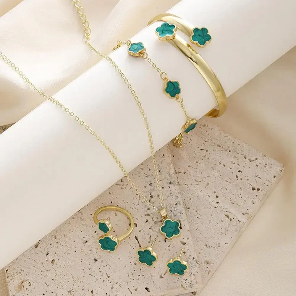 Plum Blossom Plant necklace and earring set featuring five leaf flower designs, crafted by Plush Fashion Hub.