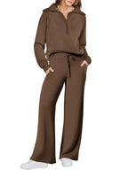 Women two-piece sweatshirt and wide-leg pants set by Plush Fashion Hub, featuring a cozy sweatshirt and stylish wide-leg pants.