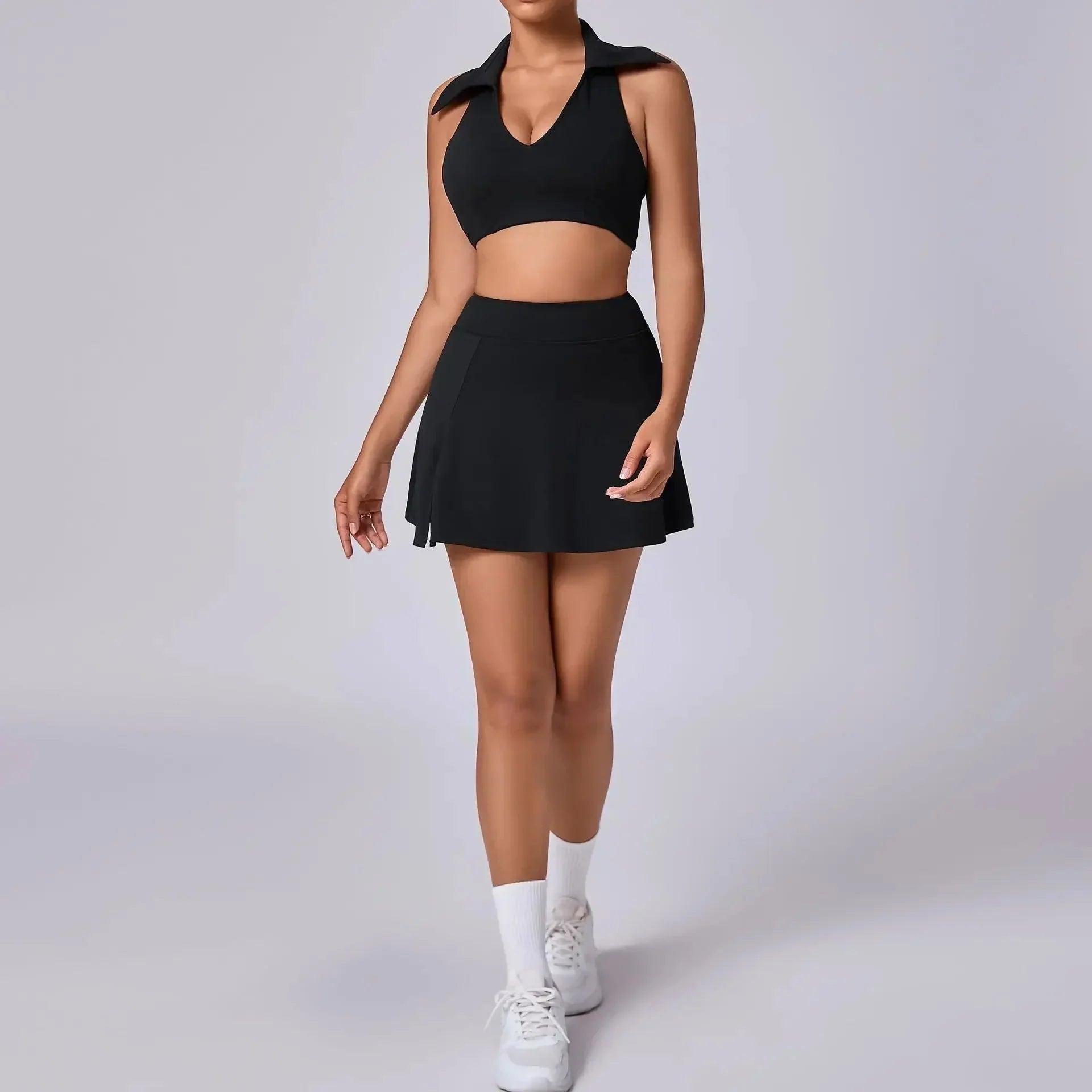 FitiqueFit seamless tennis skirt set with quick-dry activewear fabric, featuring a sporty skirt and matching top for workout sessions.