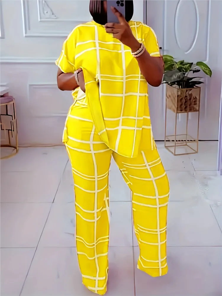 Plus size women’s casual two-piece set with striped grid print and round neck from Plush Fashion Hub, featuring a stylish, comfortable design.