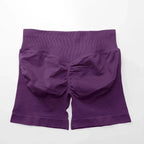 Women's seamless scrunch butt gym shorts for fitness and yoga, designed for high-performance workouts by NCLAGEN Gym Wear.