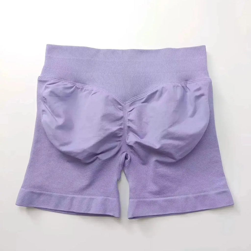 Women's seamless gym shorts with scrunch butt design, ideal for high-performance fitness and yoga by NCLAGEN Gym Wear.