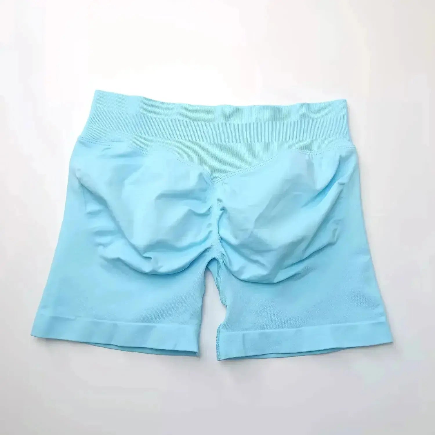 Women's seamless scrunch butt gym shorts for fitness and yoga, designed for high-performance workouts and comfortable movement.