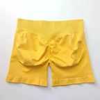 Women's seamless scrunch butt gym shorts by NCLAGEN Gym Wear, designed for high-performance fitness and yoga workouts.