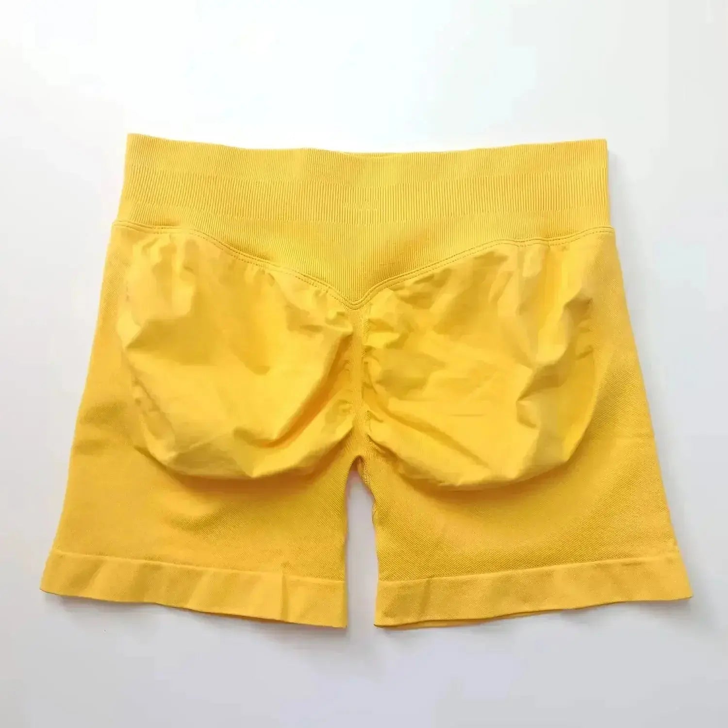 Women's seamless gym shorts with scrunch butt design by NCLAGEN, ideal for high-performance fitness and yoga workouts.
