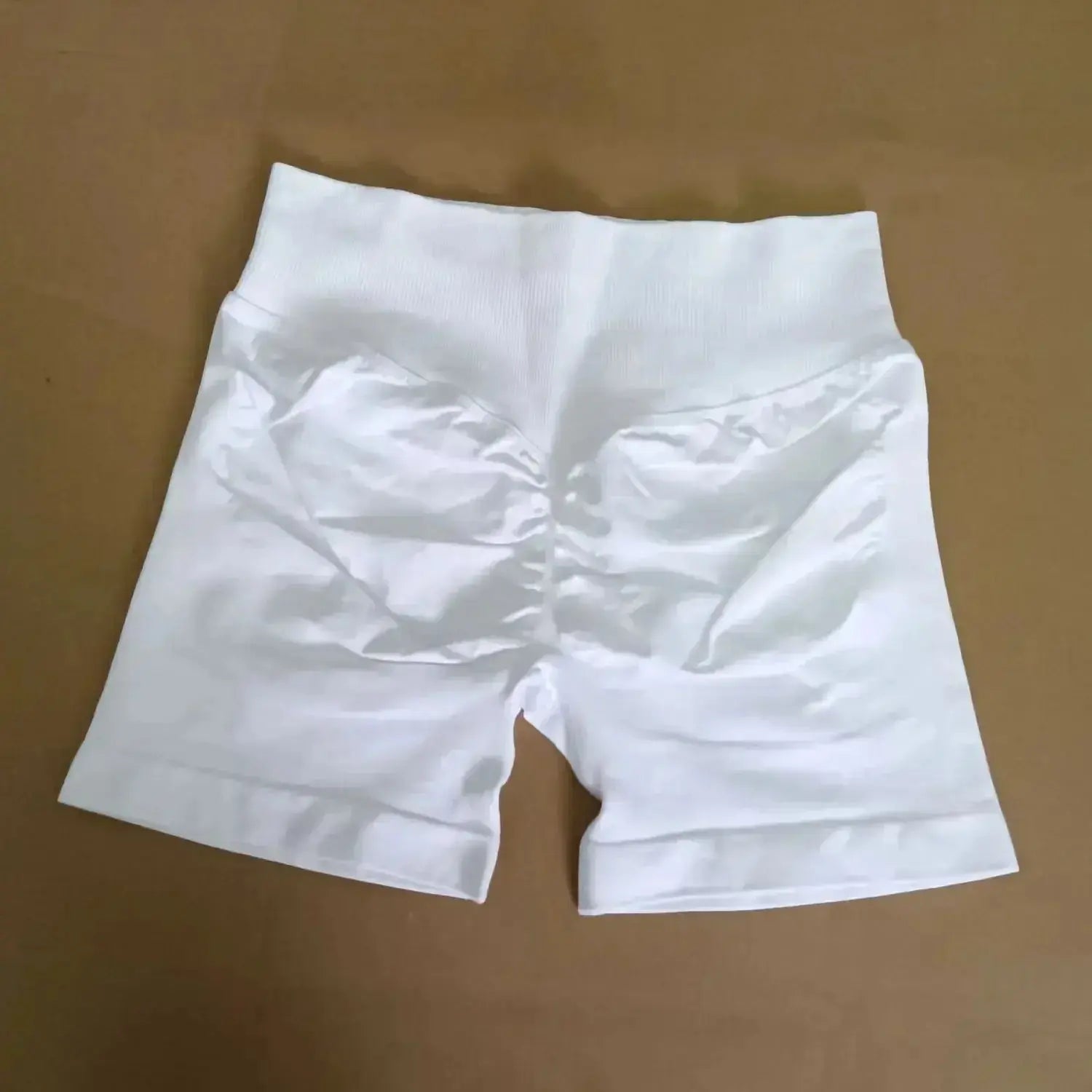 Women's seamless scrunch butt gym shorts for high-performance fitness and yoga by NCLAGEN Gym Wear, designed for comfort and style.