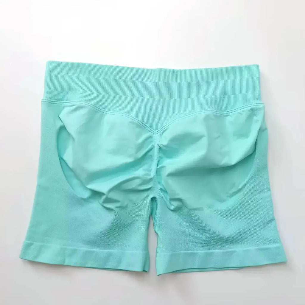 Women's seamless scrunch butt gym shorts for high-performance fitness and yoga by NCLAGEN Gym Wear, highlighting stretchy, form-fitting design.